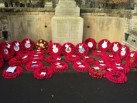 Laying the Girlguiding poppy wreath at the local cenotaph.